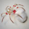 Decorative beaded spider ornament with amber crystals, red faceted beads, and gold wire legs for magical handmade décor.